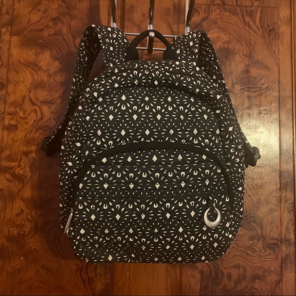 Travelon backpack purse, “anti-theft”. Black white quilted fabric.